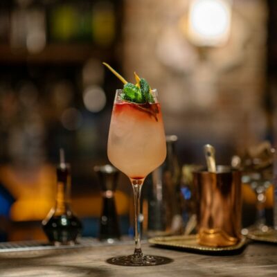 a drink sitting on top of a wooden table