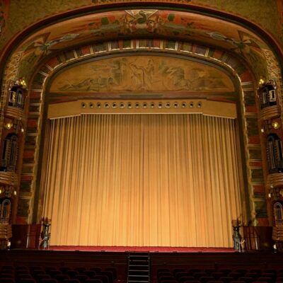 a large ornate theater with a large stage