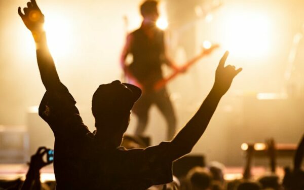 people watching band on the stage